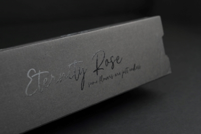 UV varnish adds shine and focus to logo on corrugated surface.